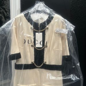 Stunning Gucci dress brand new with tags. Great material, very classy.